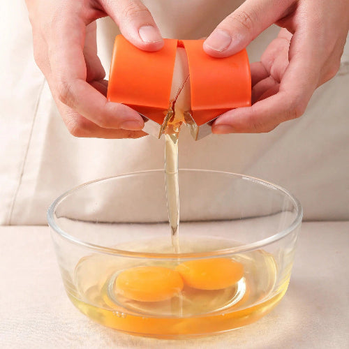 coupe-oeuf-lames-inox-separateur-en-action-orange